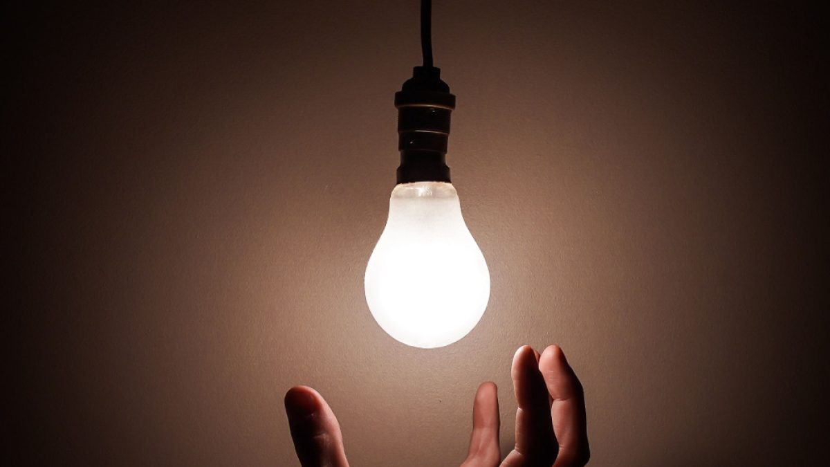 person-holding-white-light-bulb-3651820